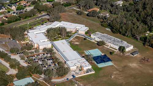 Tampa Florida, Valrico Elementary School from above, highlighting the new, light-colored roofing on multiple buildings.