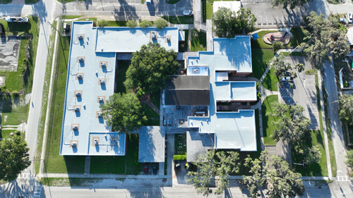 Tampa Florida, Wilson Elementary School campus from above, highlighting a completed roofing project.